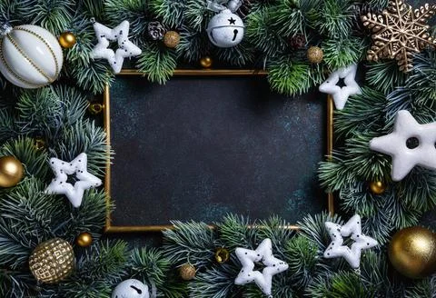 Christmas composition. Frame with pine branches and Christmas decorations on Stock Photos