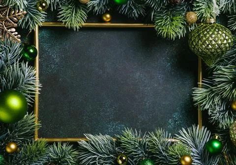 Christmas composition. Frame with pine branches and Christmas decorations on Stock Photos