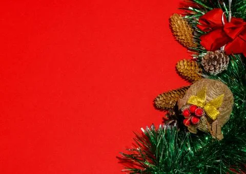 Christmas composition frame for text. Decorations on red background. Flat lay Stock Photos