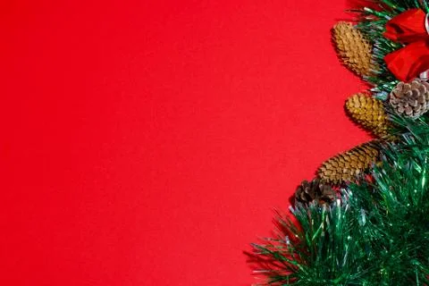 Christmas composition frame for text. Decorations on red background. Flat lay Stock Photos