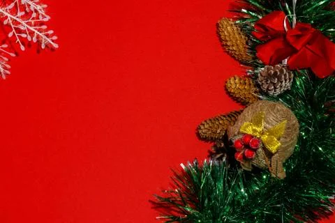 Christmas composition frame for text. Decorations on red background. Flat lay Stock Photos