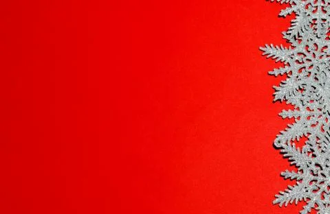 Christmas composition frame for text. Decorations on red background. Flat lay Stock Photos