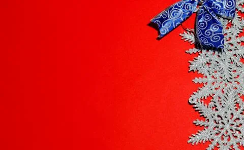 Christmas composition frame for text. Decorations on red background. Flat lay Stock Photos