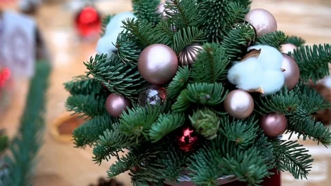 Christmas composition in gift box on light wooden surface table, close-up 스톡 동영상 89240104