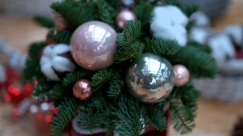 Christmas composition in gift box on light wooden surface table, close-up Video stock 89240474