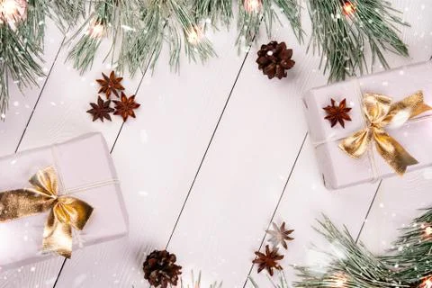 Christmas composition. gift boxes and fir branches Stock Photos