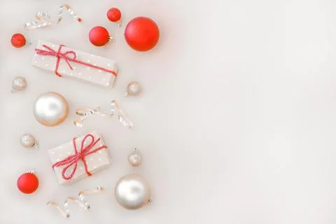 Christmas composition with gift boxes and Christmas ornaments. Stock Photos