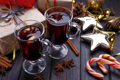 Christmas composition with gift boxes, mulled wine, baubles and Stock Photos