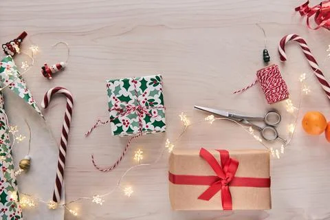 Christmas composition. Giftboxes, presents wrapping with paper and ribbon, .. Stock Photos