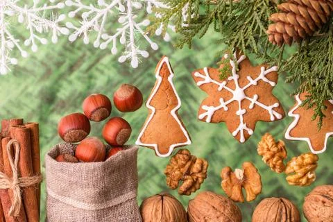 Christmas composition with gingerbread and nuts Stock Photos