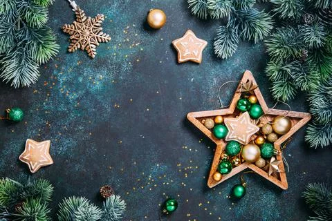 Christmas composition. Gingerbread, pine branches, green and gold  decoration Stock Photos