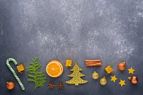 Christmas composition on gray background, candy, Christmas toys, balloons, st Stock Photos