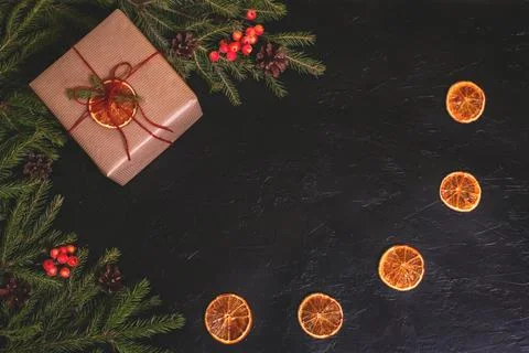 Christmas composition. Handmade gift box decorated with craft paper with Stock Photos