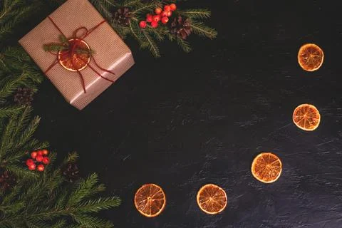 Christmas composition. Handmade gift box decorated with craft paper with brun Stock Photos
