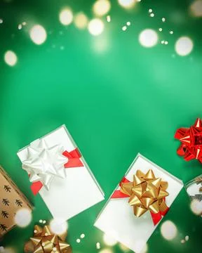 Christmas composition made of different presents on Green background. Stock Photos