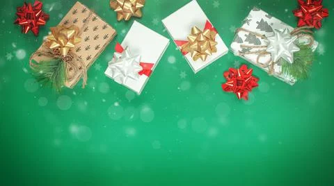 Christmas composition made of different presents on Green background. Stock Photos