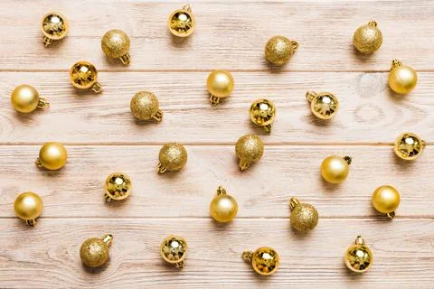 Christmas composition. a pattern of christmas balls on colored background. Fl Stock Photos