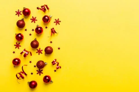 Christmas composition. a pattern of christmas balls on colored background. Fl Stock Photos