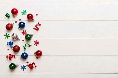 Christmas composition. a pattern of christmas balls on colored background. Fl Stock Photos