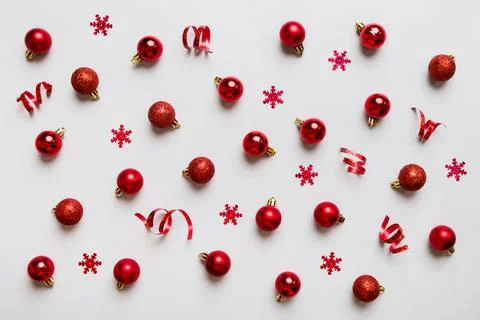 Christmas composition. a pattern of christmas balls on colored background. Fl Stock Photos