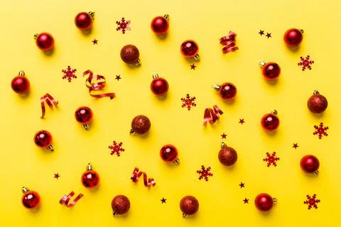 Christmas composition. a pattern of christmas balls on colored background. Fl Stock Photos