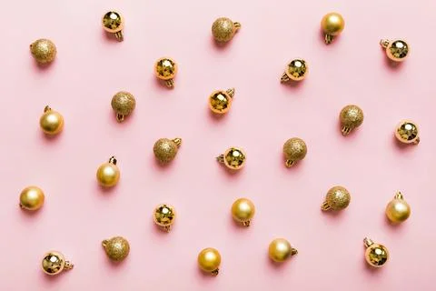 Christmas composition. a pattern of christmas balls on colored background. Fl Stock Photos