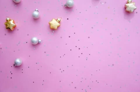 Christmas composition. A pattern of christmas balls and stars decoration. Stock Photos