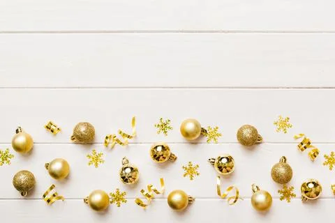 Christmas composition. a pattern of christmas balls on colored background. Fl Stock Photos