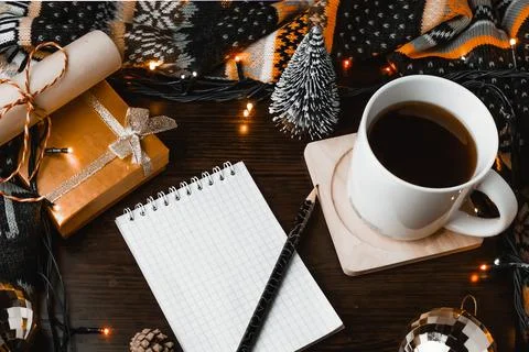 Christmas composition. Pencil prepared to write a wish list for the new year Stock Photos