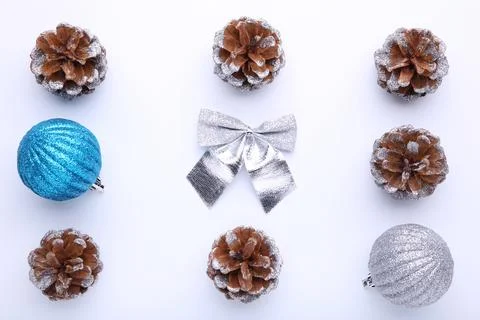 Christmas composition with pine cones and christmas balls on white background Stock Photos