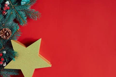 Christmas composition of pine cones, spruce branches and stack of gift boxes on Stock Photos