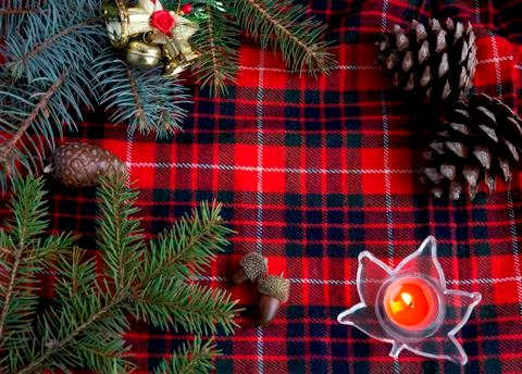 Christmas composition on plaid background Stock Photos
