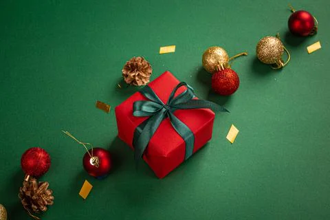 Christmas composition with present and decorations in red, green, golden colors Foto stock