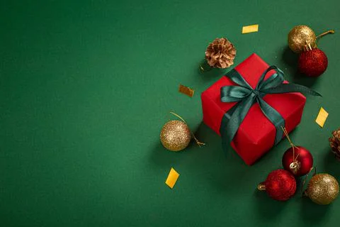 Christmas composition with present and decorations in red, green, golden colors Stock-Fotos