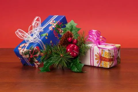Christmas composition with presents and pine needles Stock Photos