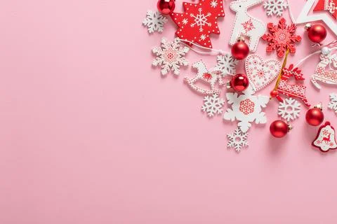 Christmas composition with red and white Christmas tree eco-toys on a light p Stock Photos