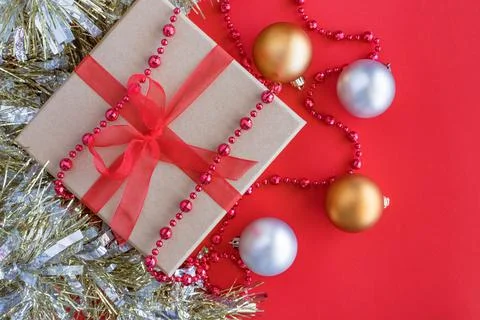Christmas composition on red background with copy space. New year gift box wi 스톡 사진