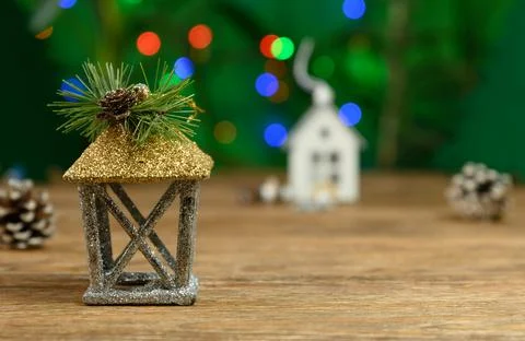 Christmas composition on rustic wooden table with copy space and color bokeh Stock Photos