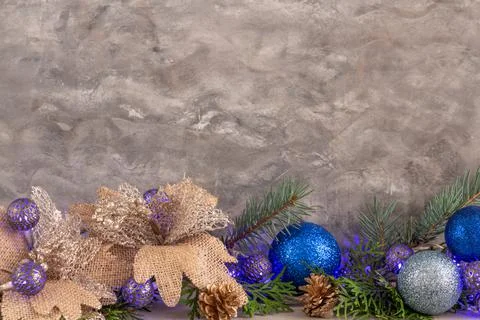 Christmas composition in silver blue color, blue garland and spruce, copy space Stock Photos