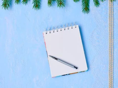 Christmas composition from the Sketch book, pen, beads, lace on a blue backgr Stock Photos