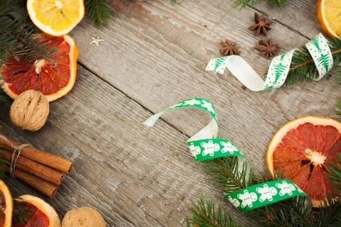 Christmas composition. Spruce branches, candy cane, warming tea Stock Photos