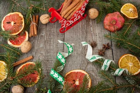 Christmas composition. Spruce branches, candy cane, warming tea Stock-Fotos