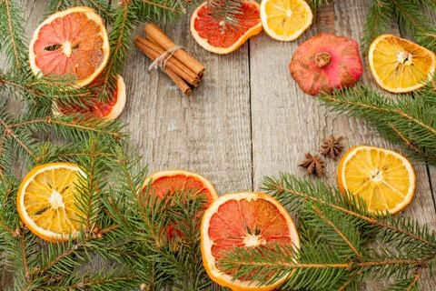 Christmas composition. Spruce branches, candy cane, warming tea Stock Photos