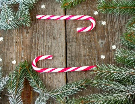 Christmas composition. Spruce branches, candy cane, snowflake, Stock Photos