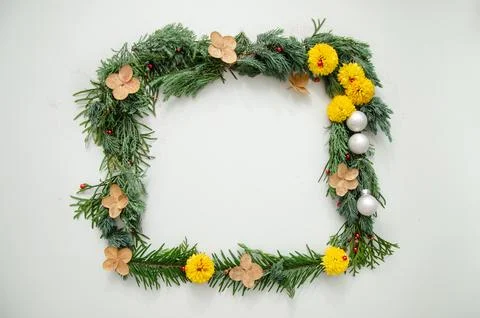 Christmas composition. Square frame made of pine, cypress, thuja branches. Stock Photos