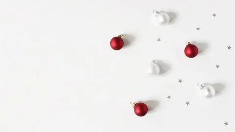 Christmas composition. Still and moving Christmas red and white balls, baubles Video stock 97793695