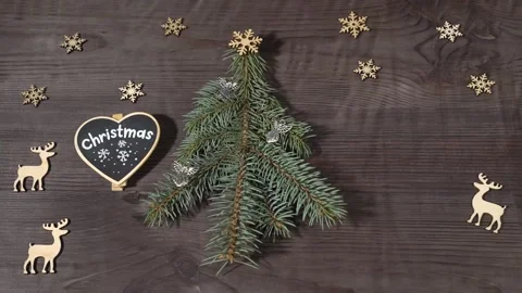 Christmas composition with a stylized Christmas tree, deer, snowflakes. 스톡 동영상 144467148