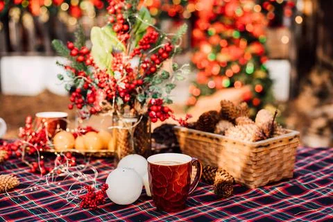 Christmas composition on a table in the yard on a sunny day Stock Photos