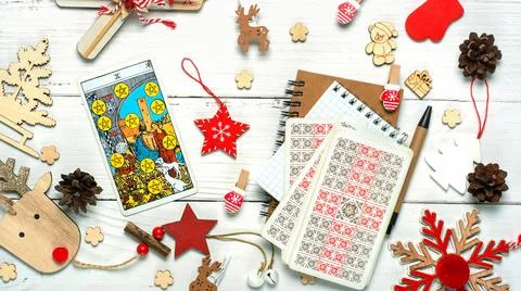 Christmas composition with Tarot cards. Esoteric concept, fortune telling Stock Photos