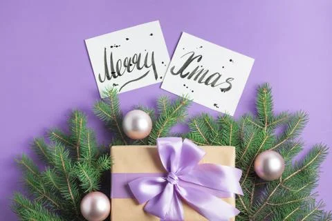 Christmas composition tree branches craft gift balls lettering Stock Photos